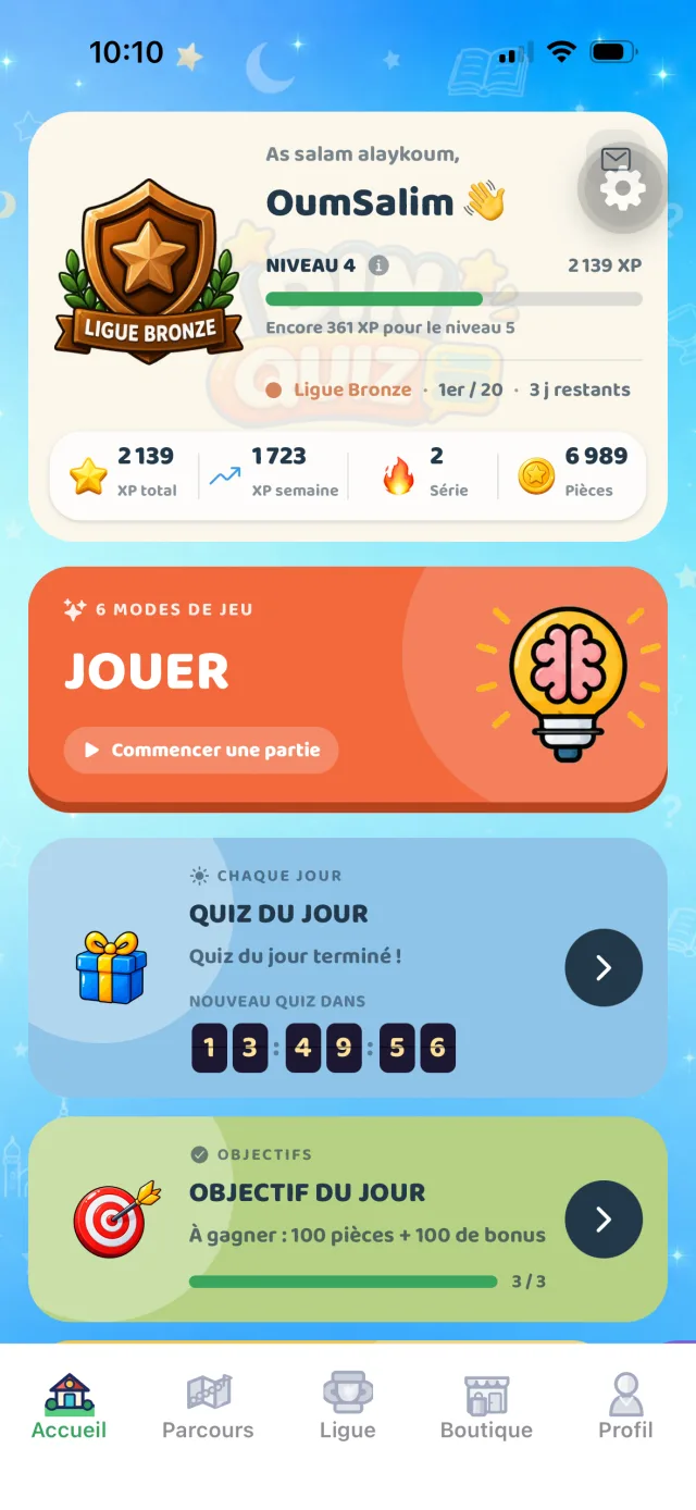 L’écran d’accueil : ta ligue, ton niveau, le bouton Jouer, le quiz du jour et l’objectif du jour